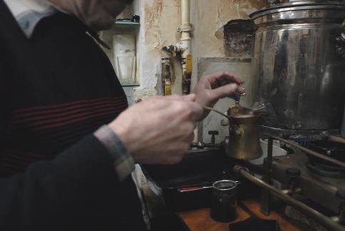 Pour Water into Turkish Coffee Cup